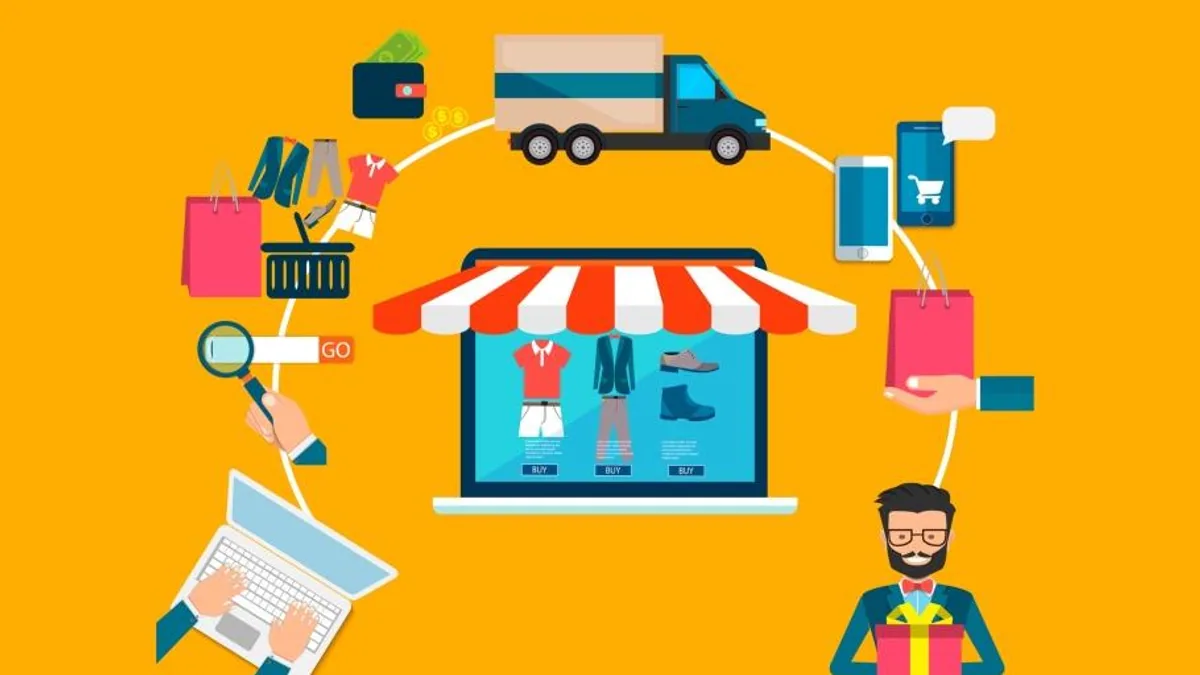 Commerçante préparant une commande devant un ordinateur portable dans sa boutique